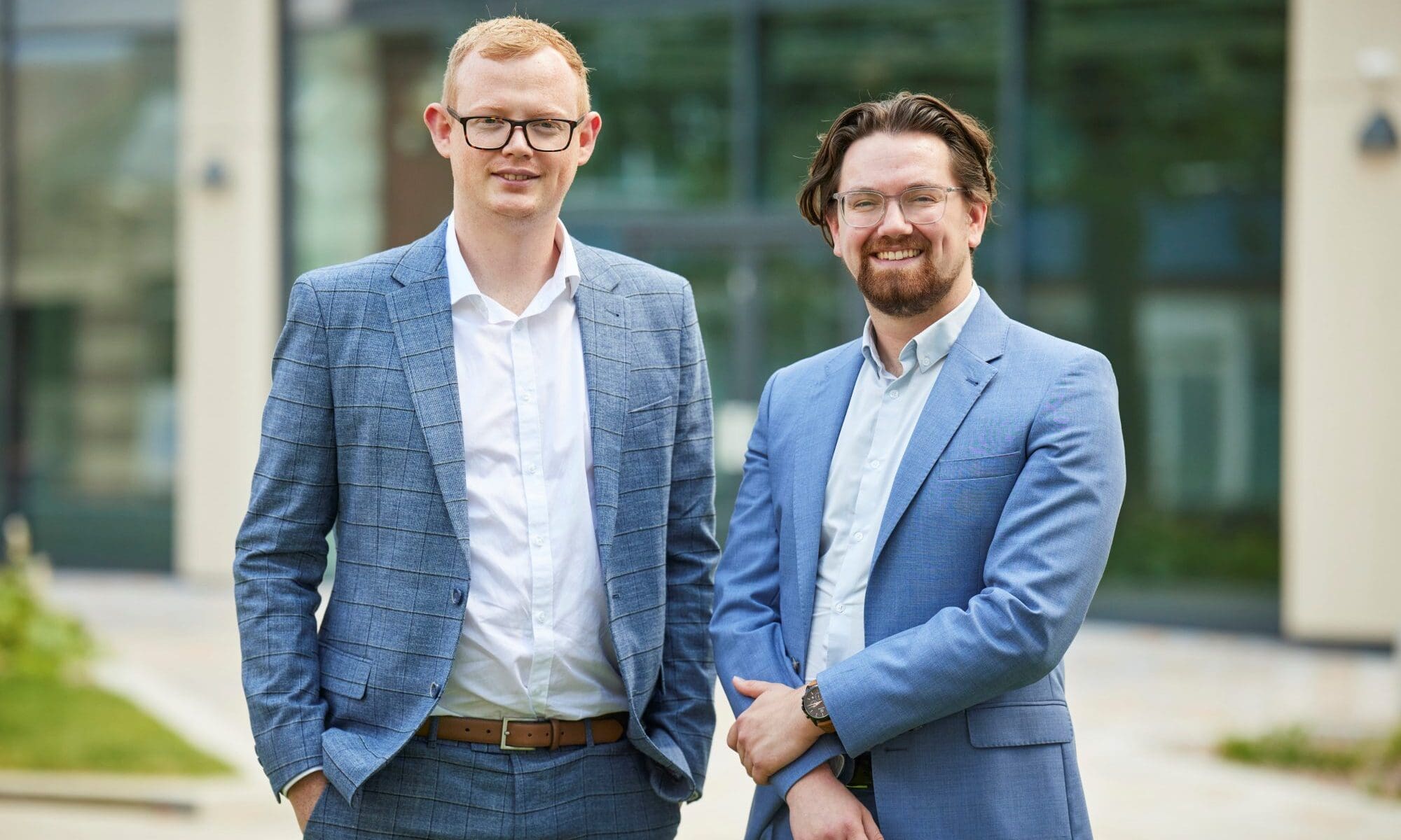 Hurst promotes two in business services team